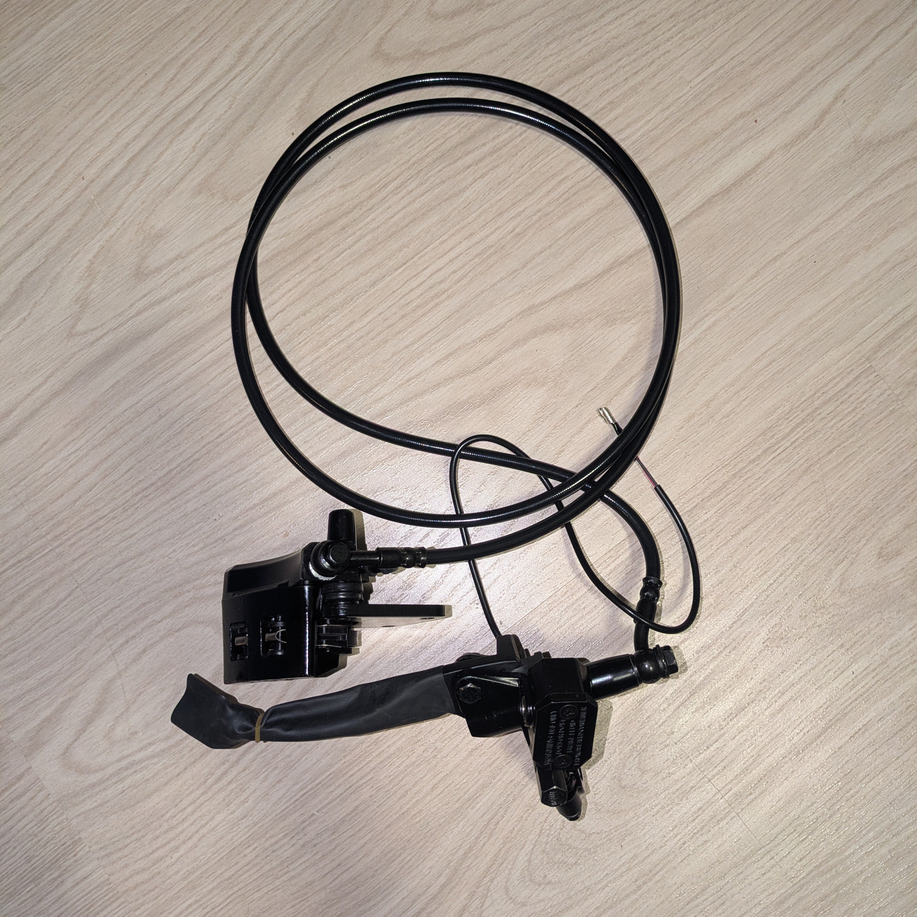 Jarrujärjestelmä taakse - E-Mini